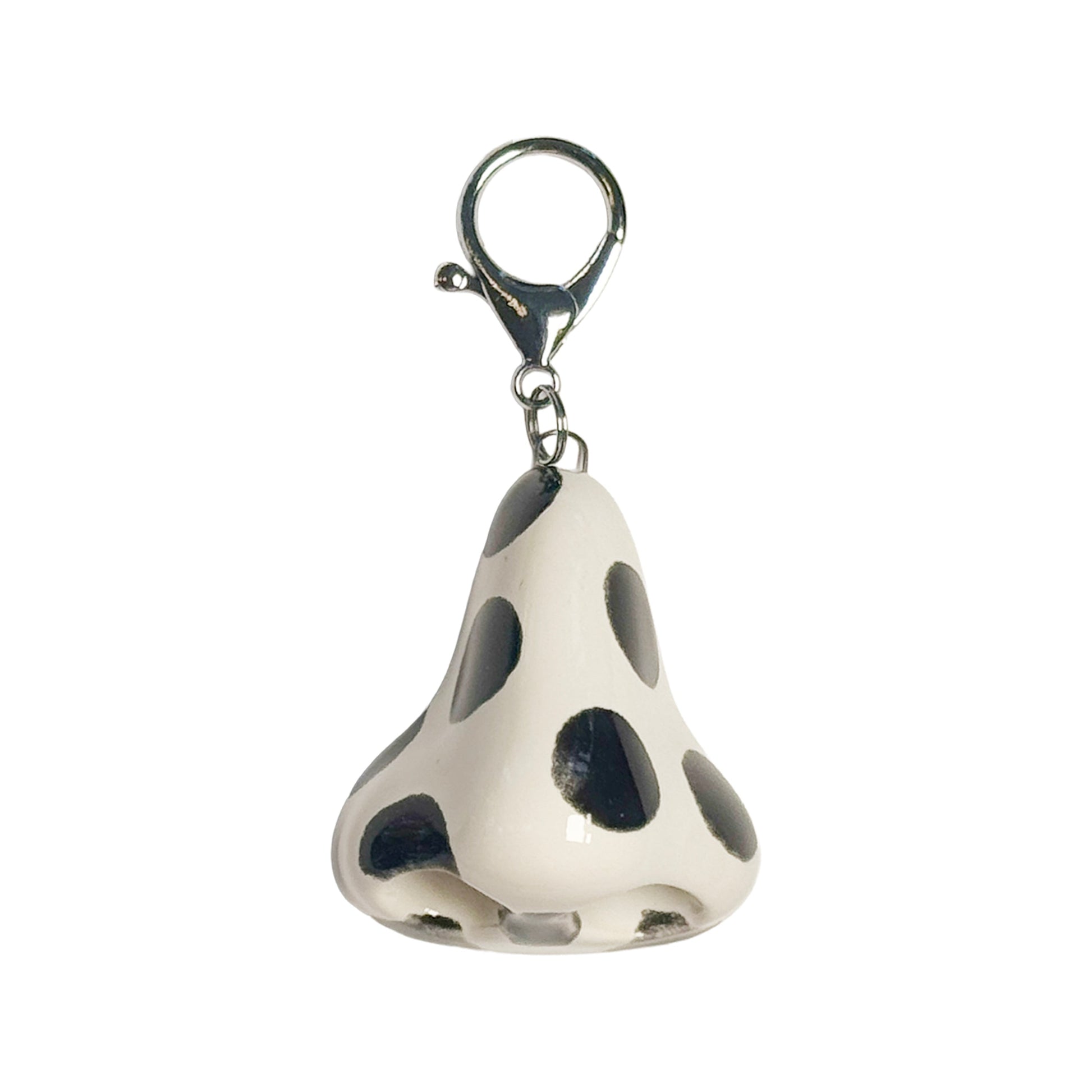 Keychain shaped like a nose on a white background